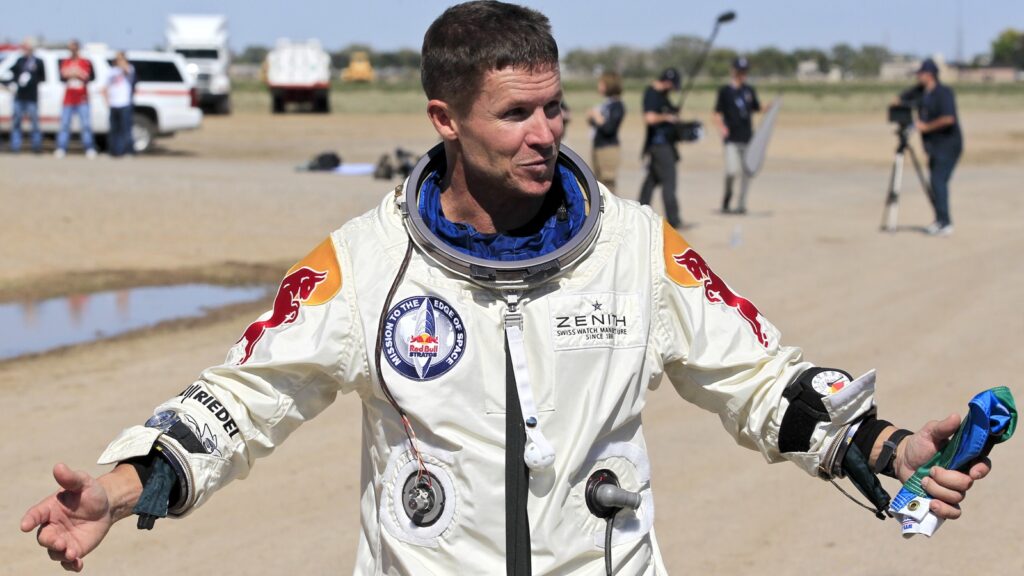 Felix Baumgartner speaks with the media after successfully jumping from a space capsule in 2012