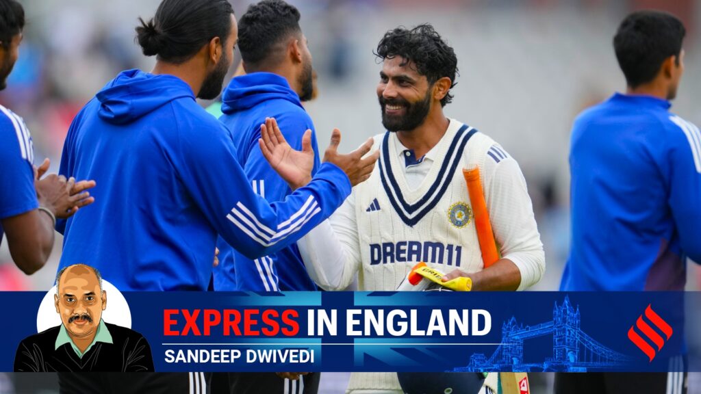 India's Ravindra Jadeja shakes hands with teammate KL Rahul on the final day of the fourth cricket Test between England and India at Old Trafford on Manchester. (AP Photo)