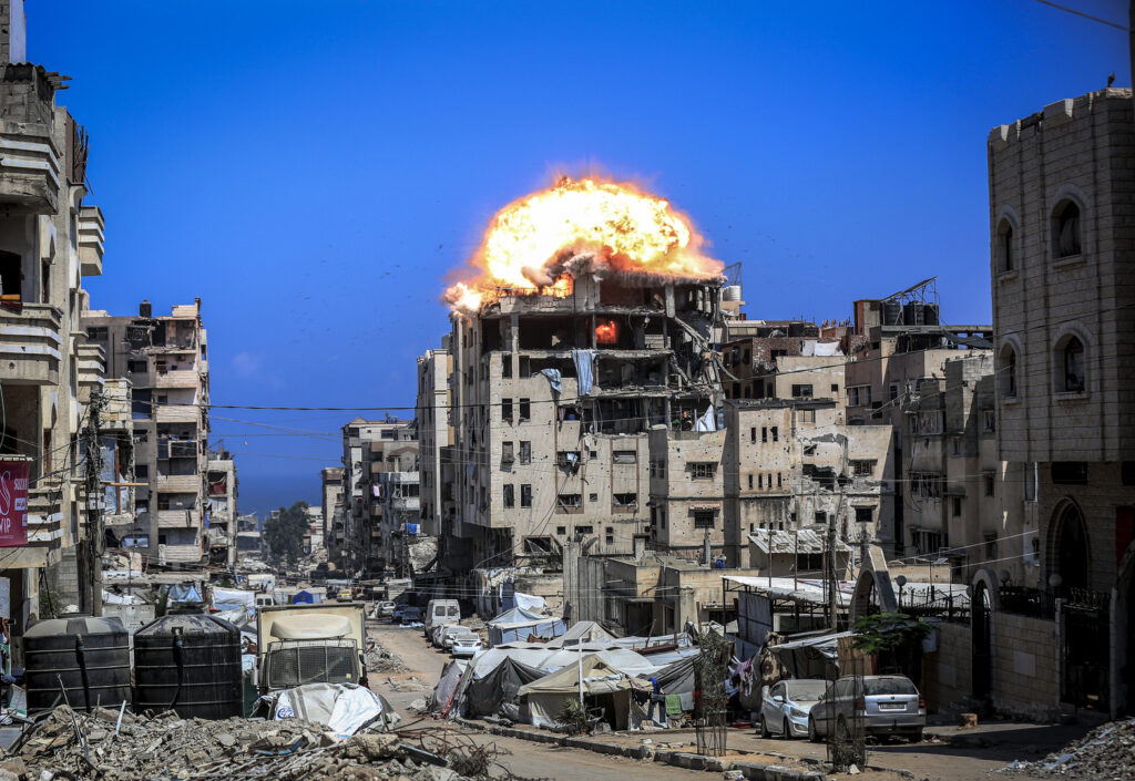 Moment Israeli strike hits Gaza building housing displaced