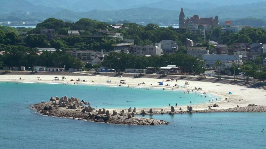 This combination of images taken from a fixed position video shows a beach immidiately after a strong earthquake near Russia’s Kamchatka Peninsula, above, and after people evacuated following a tsunami warning, in Shirahama, Wakayama prefecture, western Japan Wednesday, July 30, 2025.