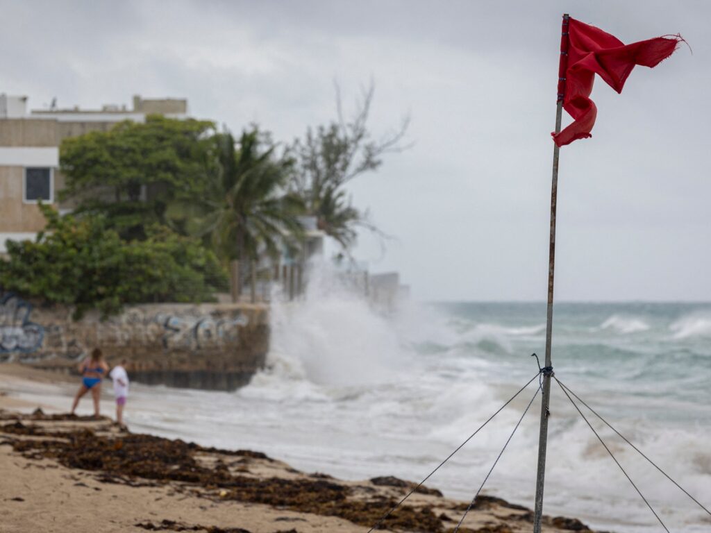 Erin downgraded to Category 3 hurricane, NHC says | Climate News