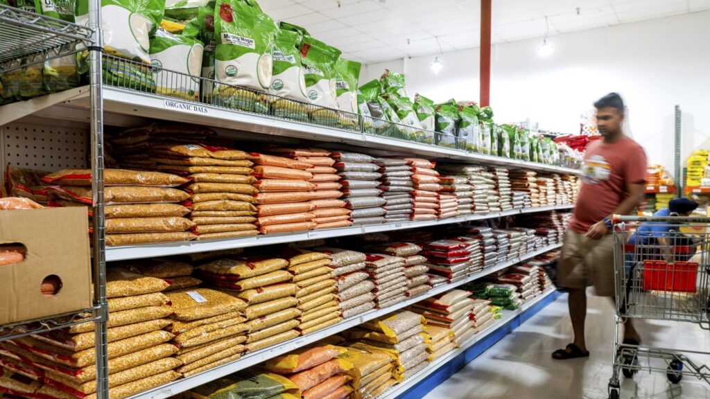 Trump's broad tariffs go into effect, just as economic pain is surfacing : NPR