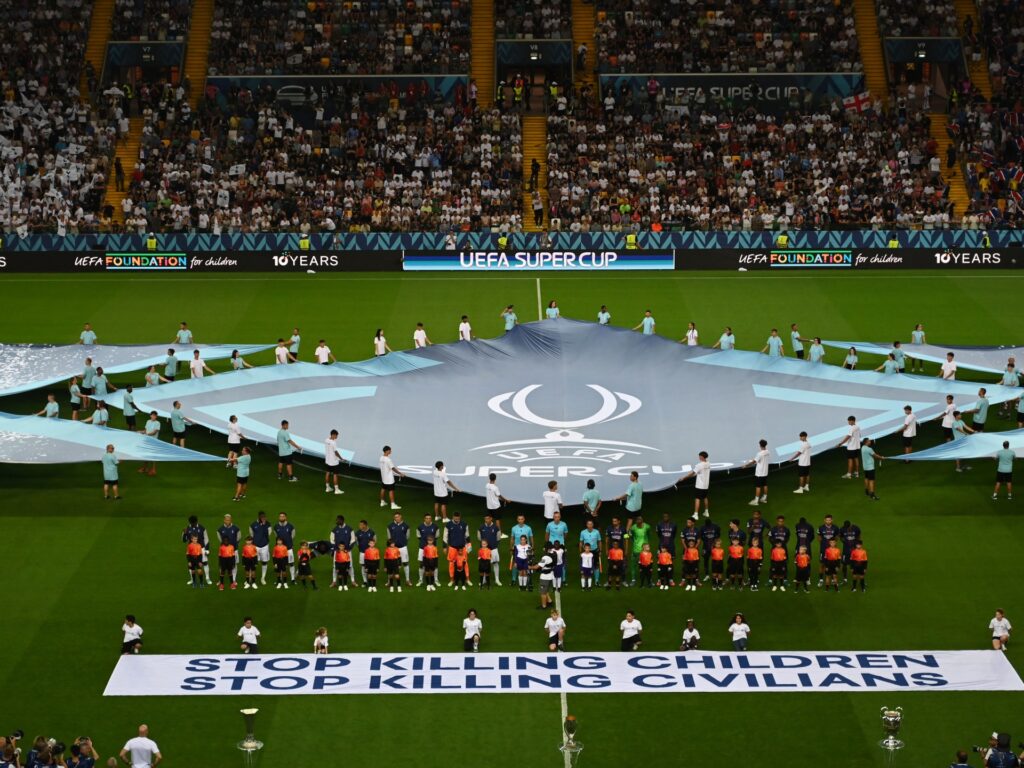 UEFA unfurls Gaza-related plea banner after Palestinian tribute fallout | Israel-Palestine conflict News