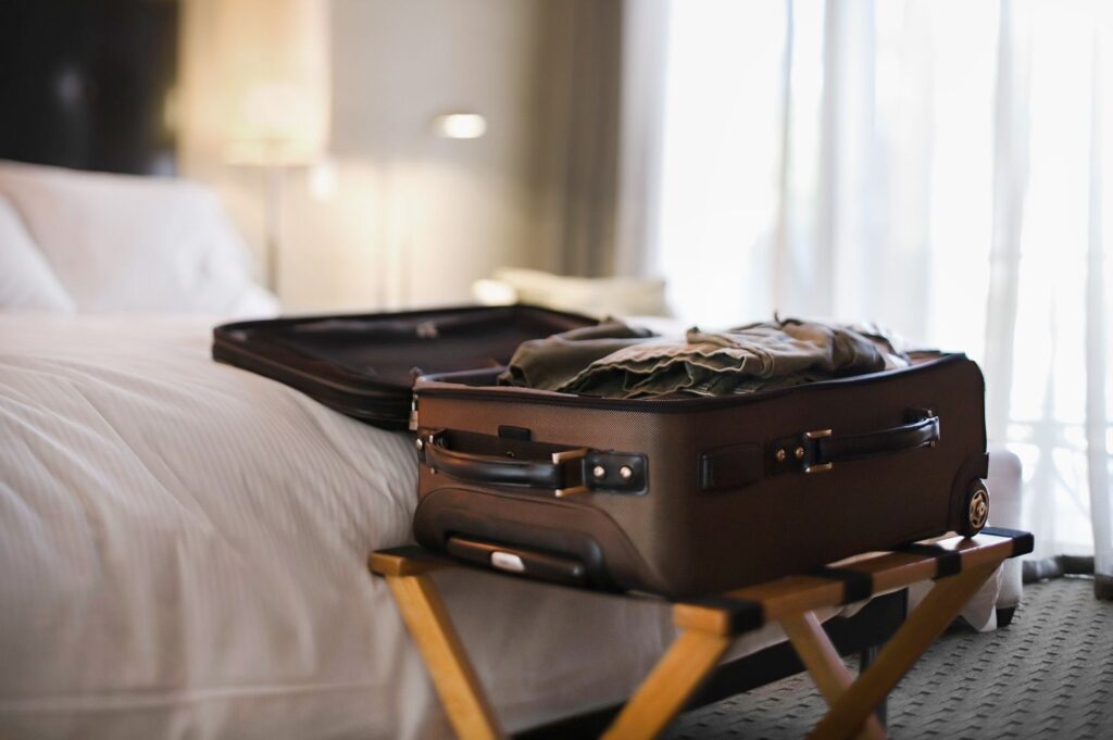 Why You Should Never Leave Your Luggage On the Hotel Room Floor, According to Travel Experts