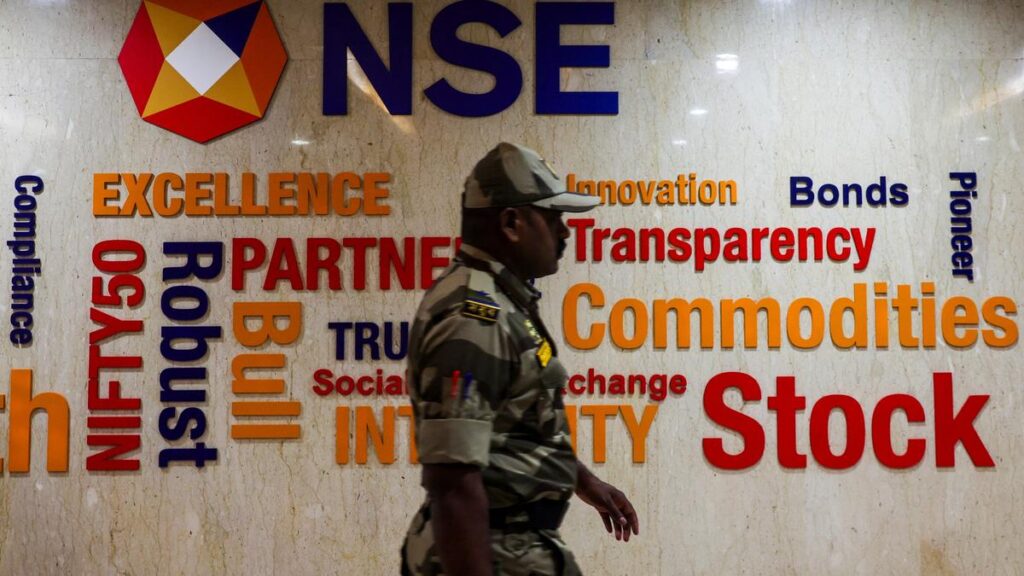 Sensex, Nifty decline for fourth day on profit taking in bank, auto shares; Sensex down 386 points