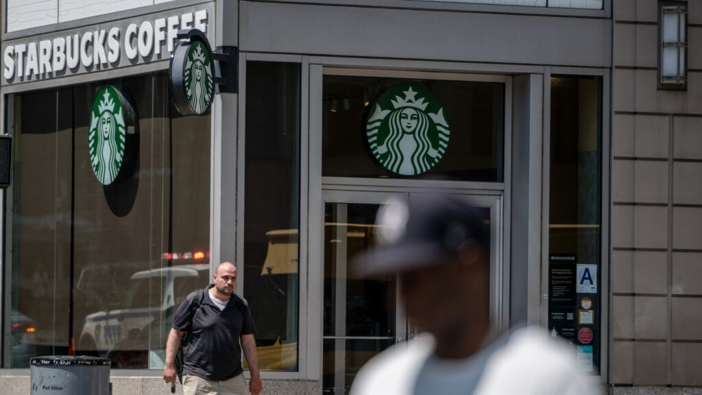 Starbucks is closing stores, cutting 900 corporate jobs in a turnaround : NPR