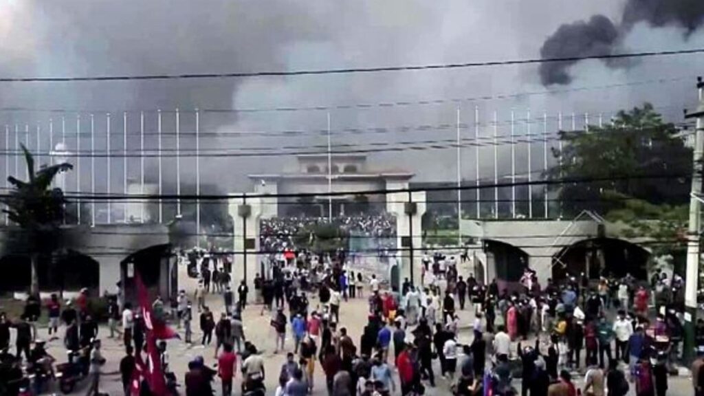 Protesters set the Parliament building on fire as the protest turned violent, in Kathmandu on Tuesday. (ANI Video Grab)