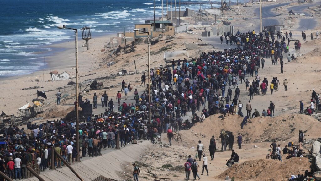 Israel-Hamas ceasefire takes effect, Gazans head home as troops pull back