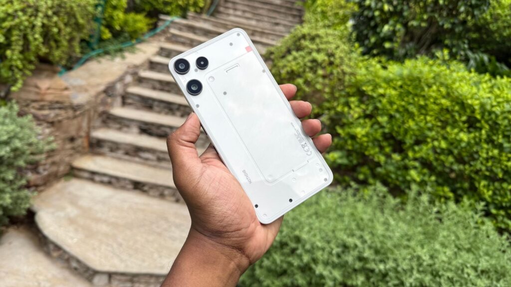 Nothing Phone (3a) Lite hands-on: A closer look at the brand’s 1st entry-level phone | Technology News The Nothing Phone (3a) Lite in white, featuring a subtle transparent design. (Image: Bijin Jose/The Indian Express)
